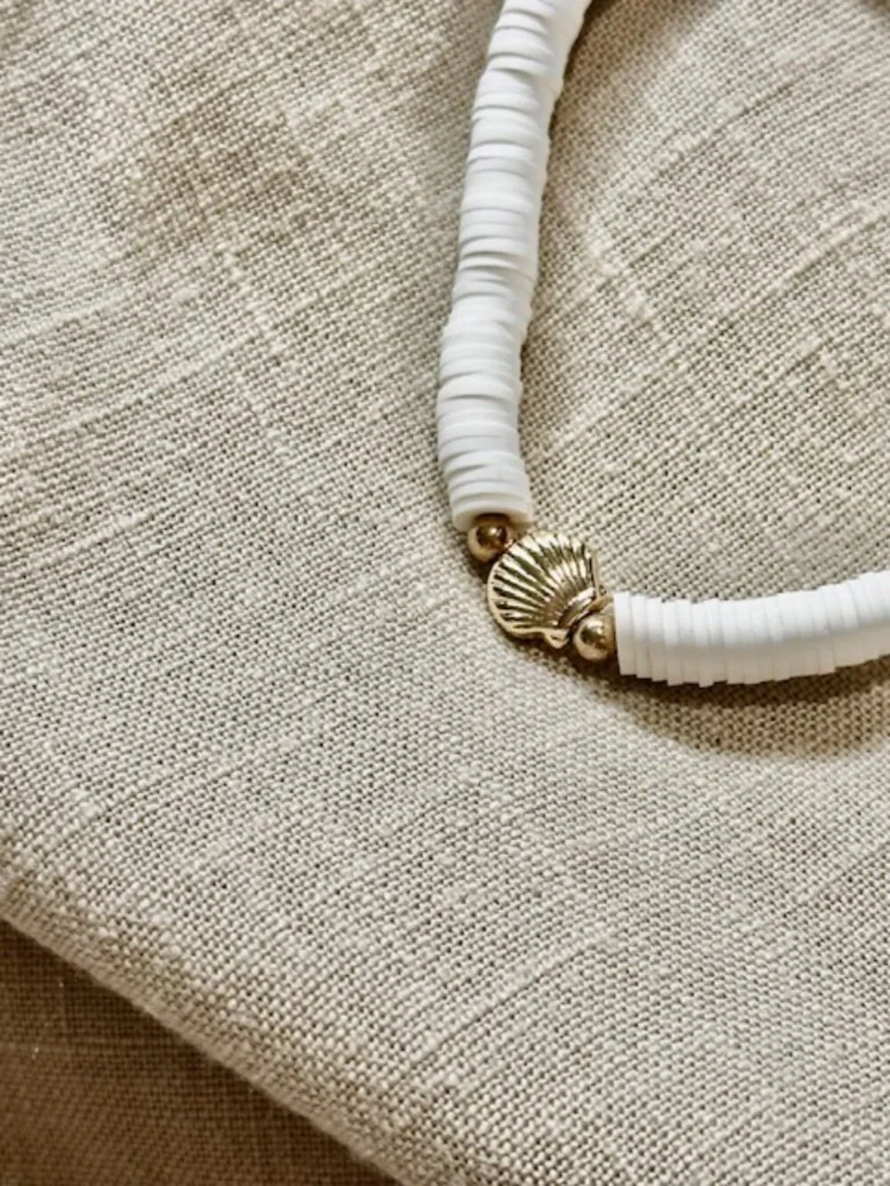 Heishi Bead Stretch Bracelet with Seashell Charm Gold Plated Accents White